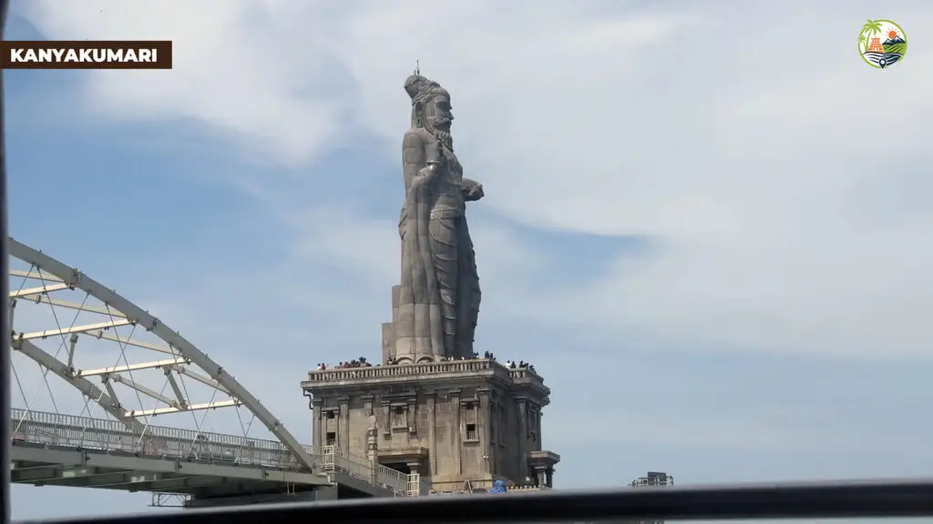 Sunrise queue at Kanyakumari jetty for the first ferry to Vivekananda Rock with boats and safety signs visible