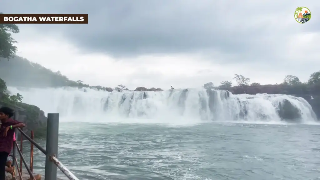 Wide curtain of Bogatha Waterfalls near Eturnagaram in Telangana with visitors at a safe viewpoint