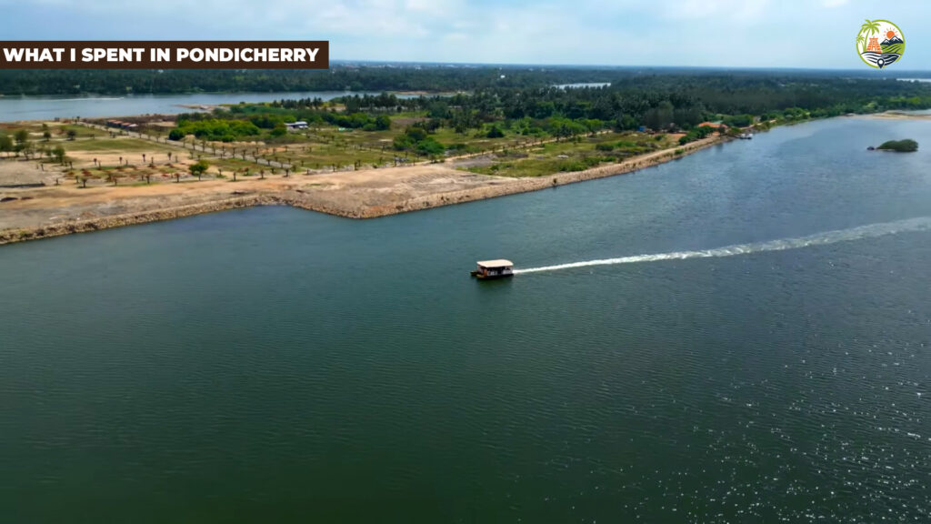 Rock Beach sunrise with walkers on the Promenade and pastel French‑style buildings, representing a budget‑friendly 3‑day Pondicherry trip.